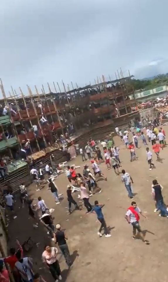 Other revellers fell from boxes after a portion of the stands collapsed