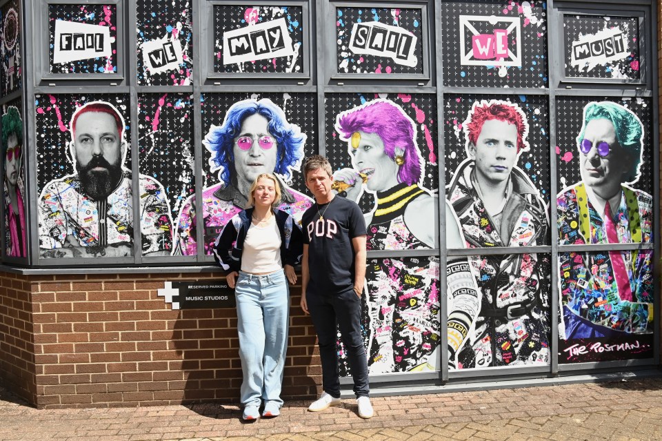 Noel Gallagher, with daughter Anais pose, commissioned Brighton artists The Postman to create this astonishing mural on the outside walls of his North London studio