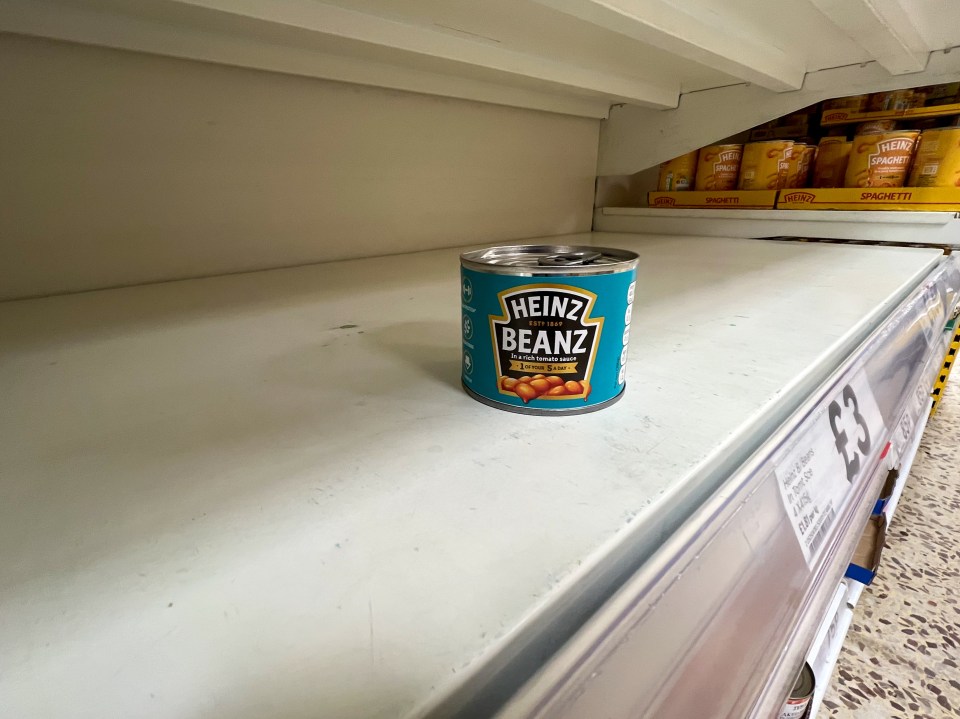 Baked beans are missing on shelves at one of Tesco's branches in Cambridge