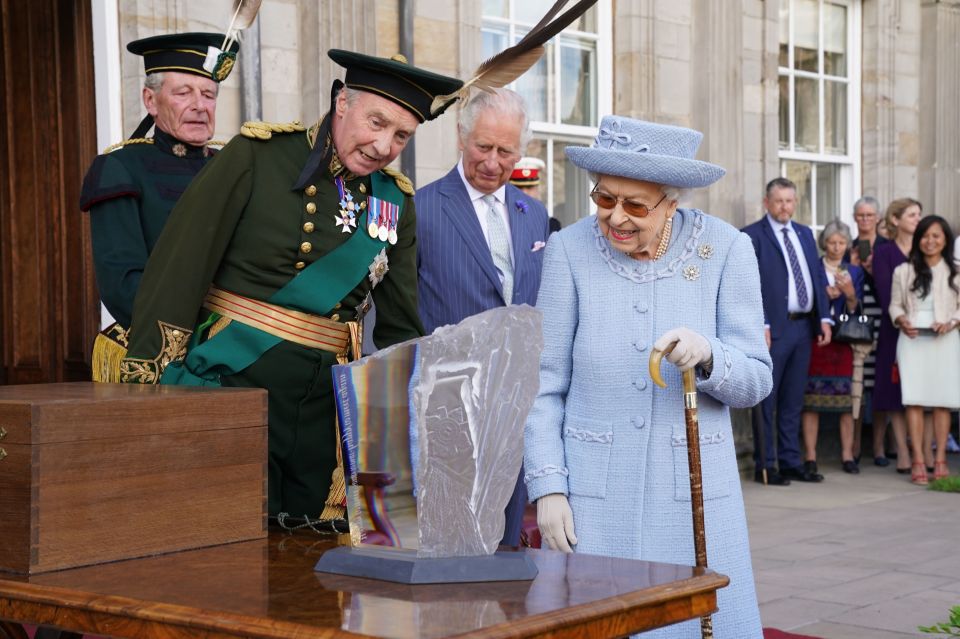 The Duke of Buccleuch presents a Redendo to the Queen