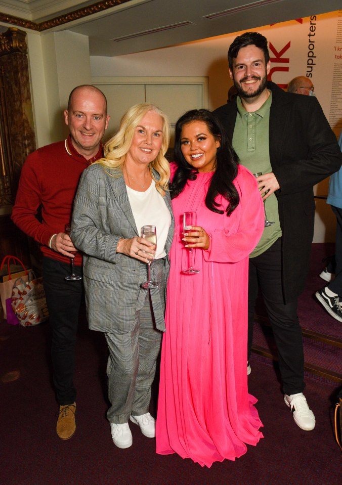 Scarlett with dad Mark, mum Betty and boyfriend Scott