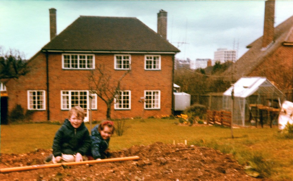 Philip and Leslie's children playing in the back of their Basingstoke home