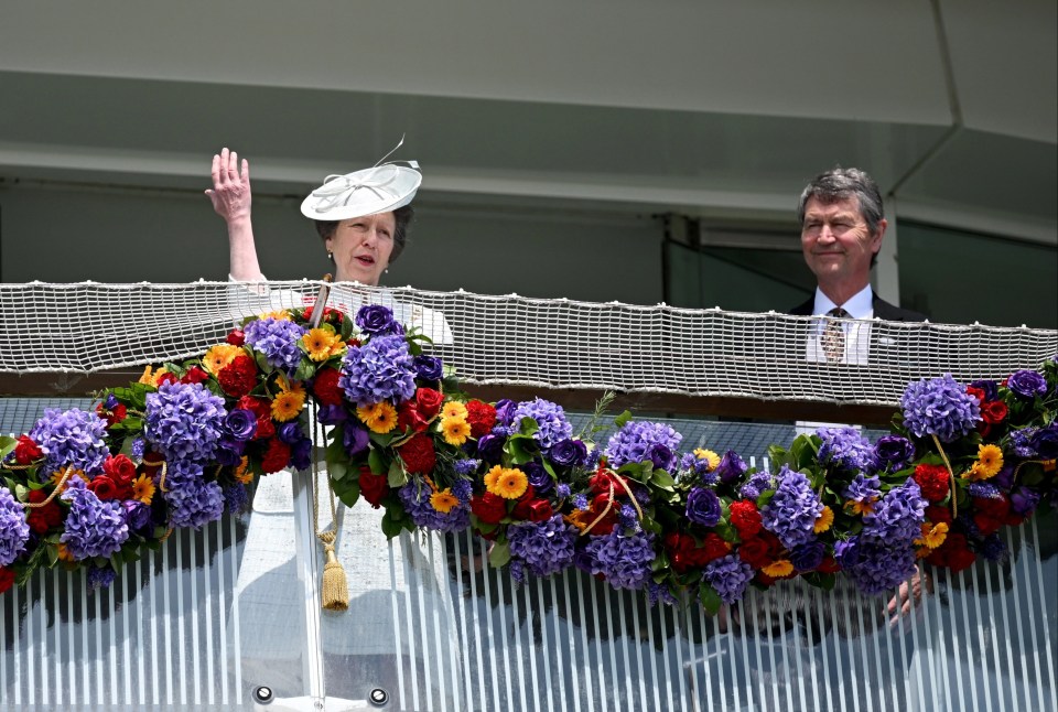 Princess Anne waved at the crowds alongside her husband Timothy Laurence