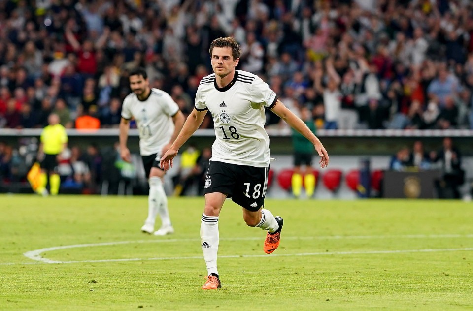 Jonas Hofmann races off in celebration after firing Germany ahead against England