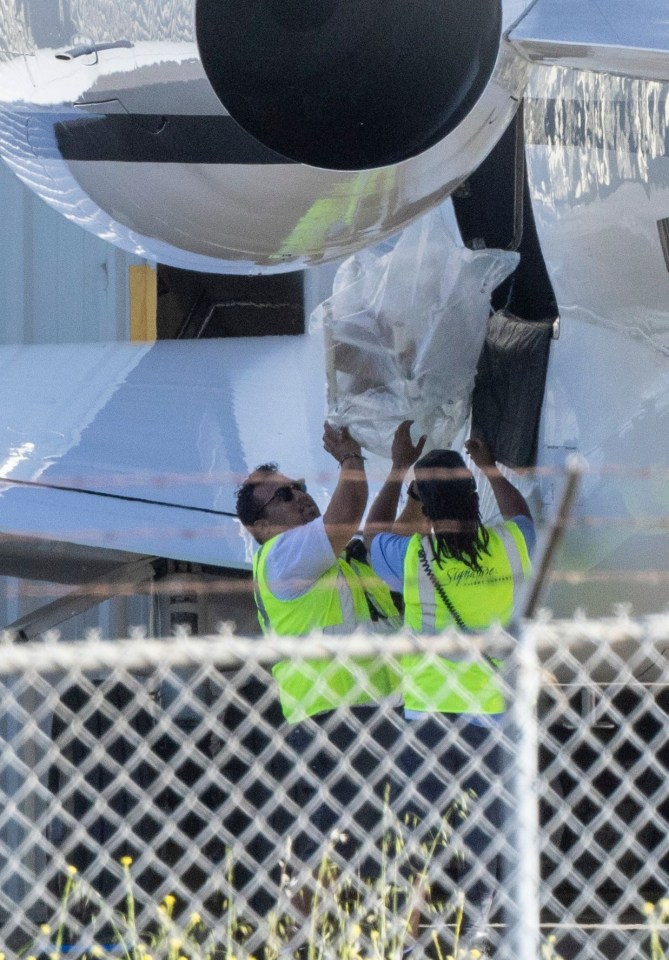 A high chair appeared to be offloaded from the Sussex's private plane