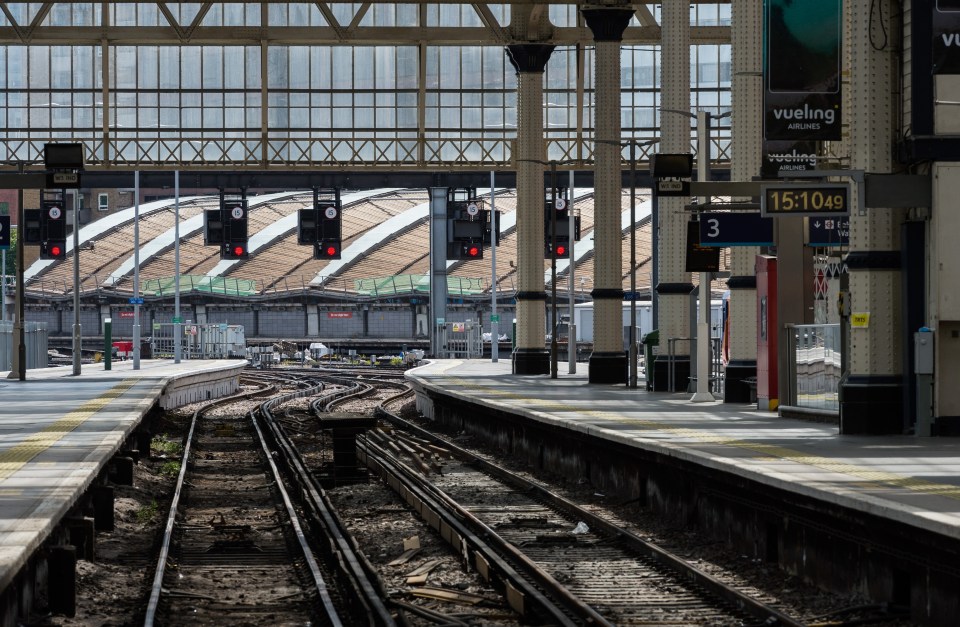 Empty railway tracks at Waterloo station as the country's transport system is crippled by strike action