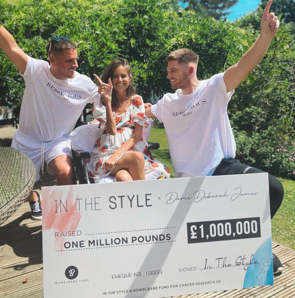 Hero fundraiser Deborah James, pictured with In The Style boss Adam Frisby and his partner Jamie Corbett, raised a glass today as her range netted £1m for the BowelBabe Fund