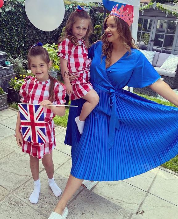 Jac looked sensational in a royal blue summer dress