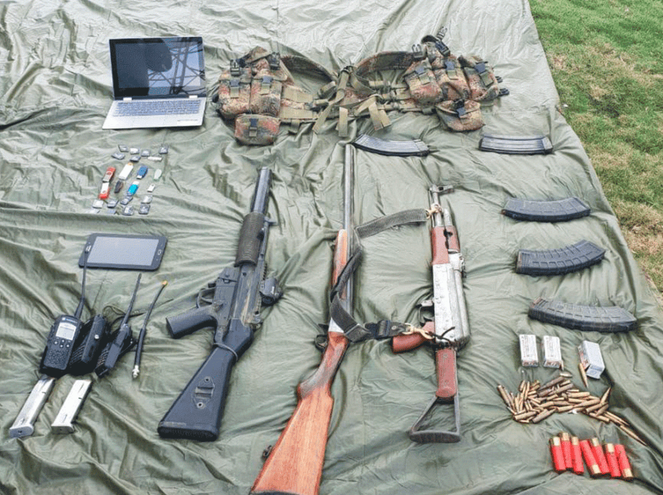 Guns and ammo seized in a drug bust in Colombia