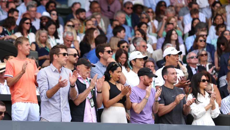 Kyrgios' box, second left to right, included his dad, sister, mate, fitness coach and girlfriend