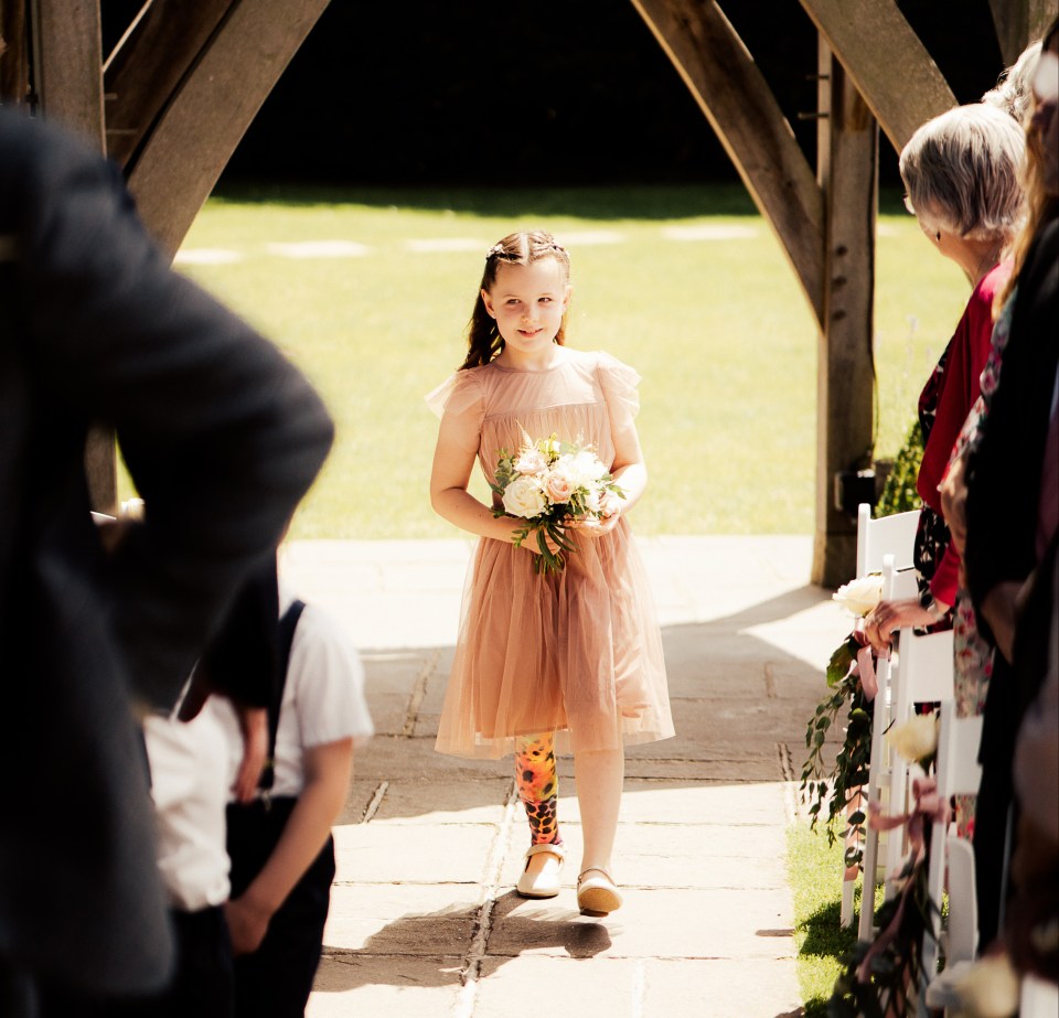 Meet the bravest bridesmaid - who vowed she would down the aisle after she had her foot amputated