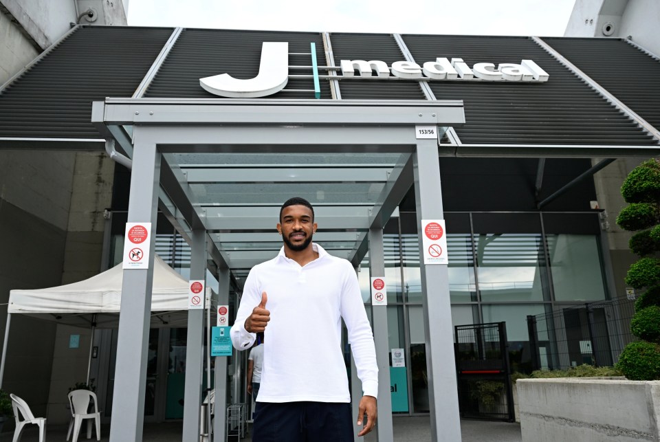 Gleison Bremer offers a thumbs up as he arrives at Juventus' medical facility