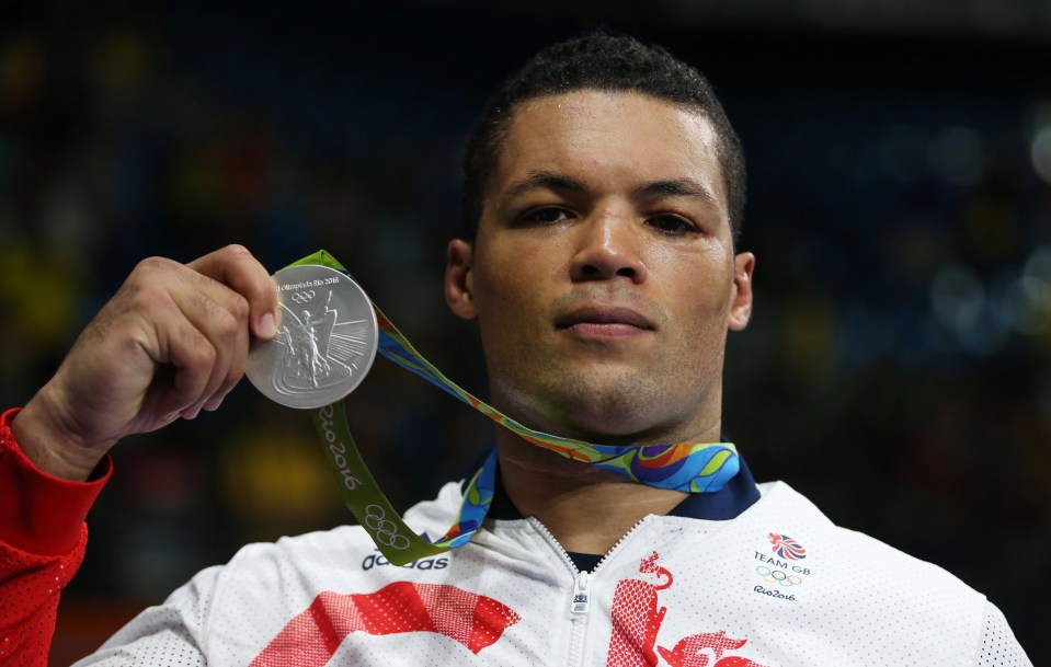 Joe Joyce poses with his 2016 Olympic silver medal