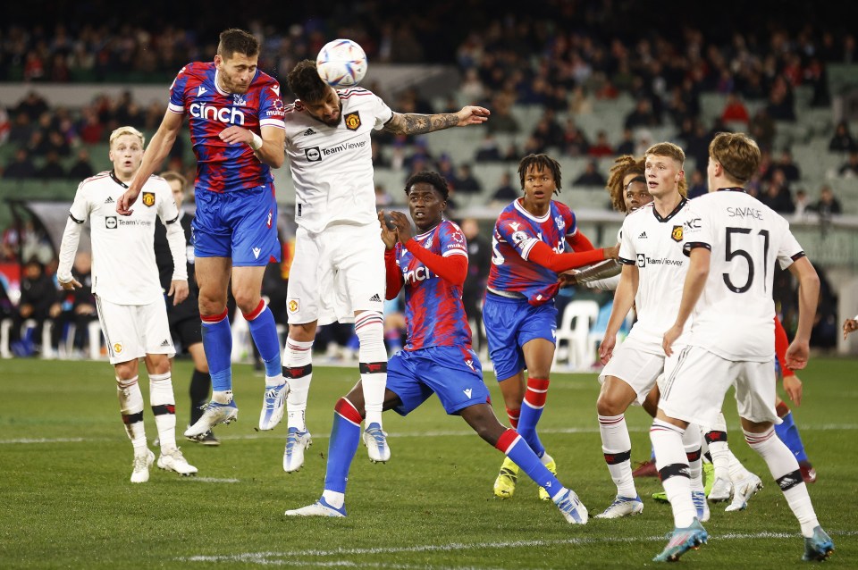 Joel Ward rises to head past David de Gea