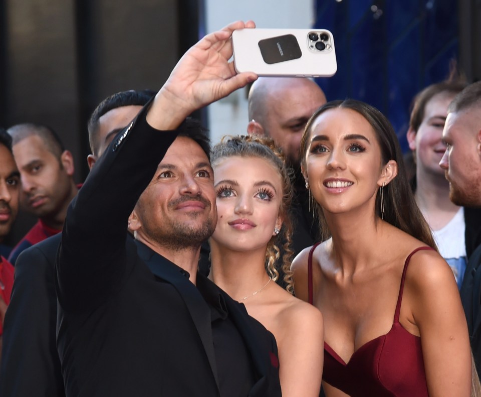 They also all posed together for a selfie at the charity event