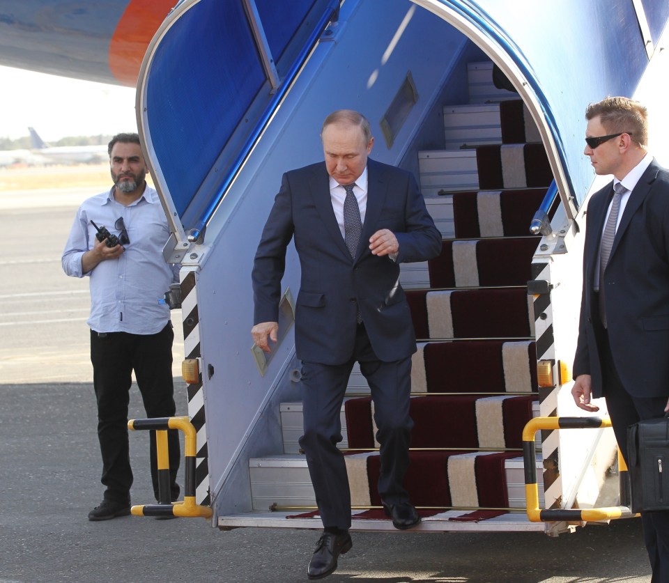 A body language expert said Putin appeared to lose control as he ‘ran’ off the steps