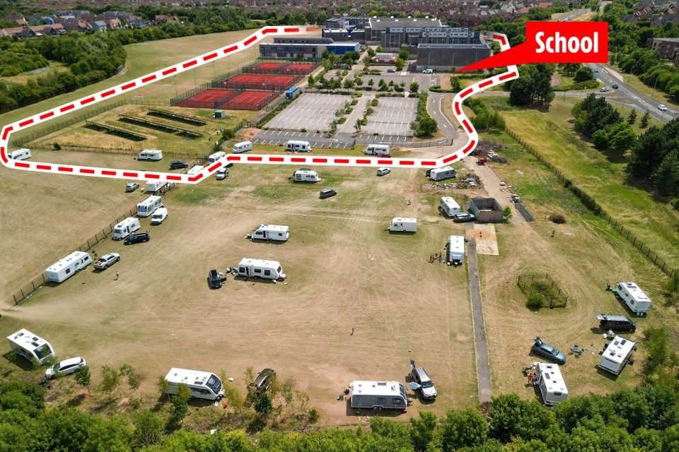 Riot cops raided a traveller camp on a school playing field in Milton Keynes