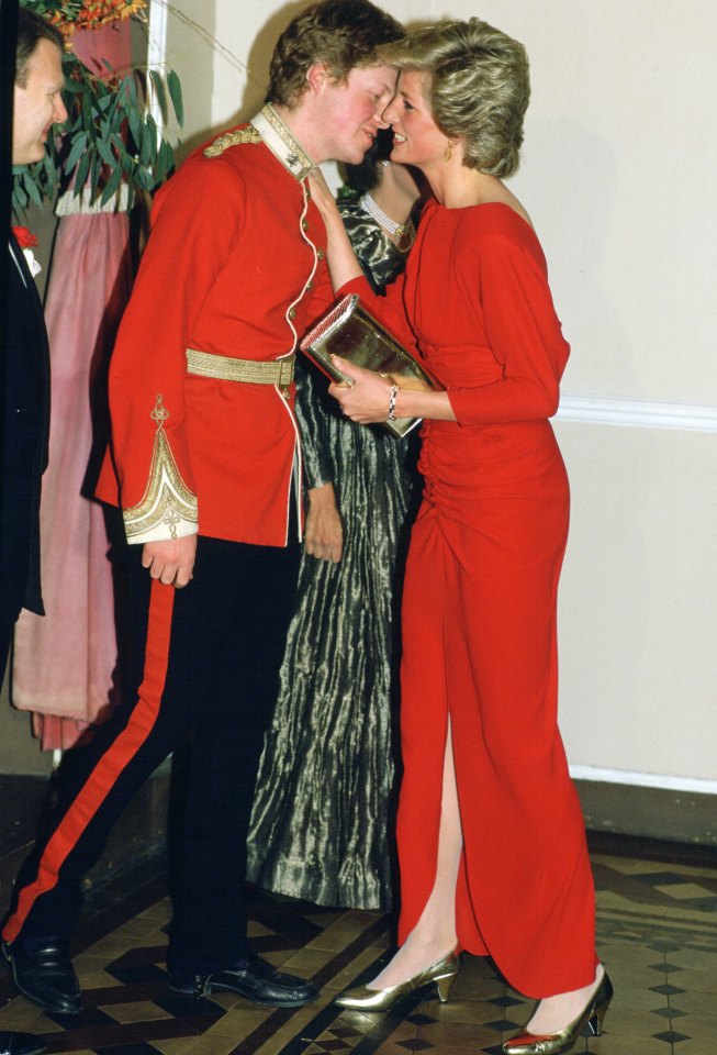 Diana, Princess of Wales kisses her brother, Earl Charles Spencer at the Birthright Ball