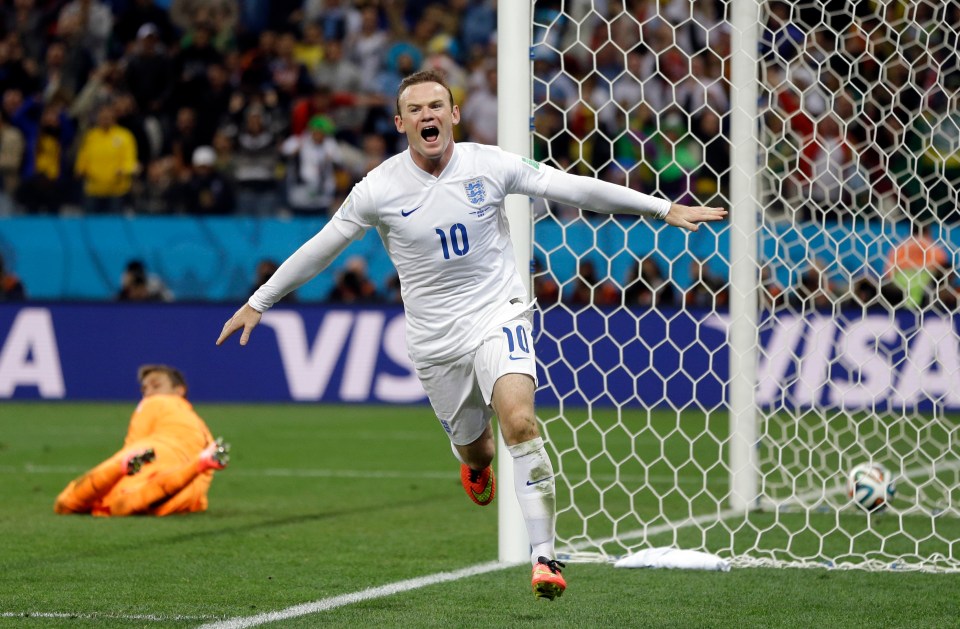 Rooney celebrates scoring for England against Uruguay at the 2014 World Cup in Brazil