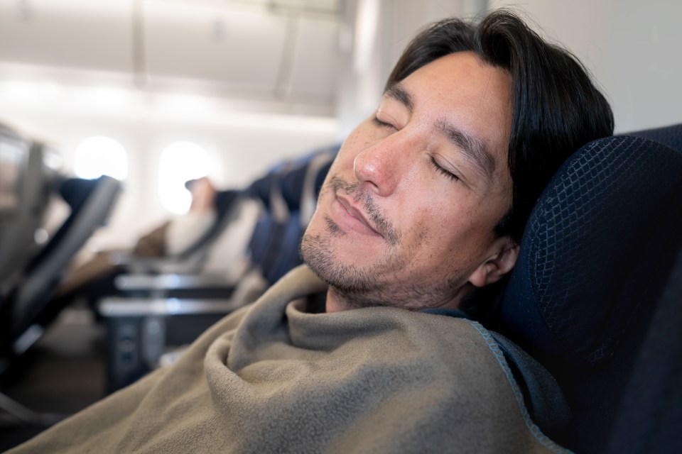 Sleeping on the plane can help you avoid jetlag if you’re due to arrive in the morning