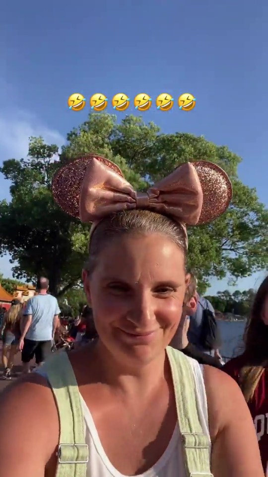 Sue wearing her rose-gold Disney ears on their last trip