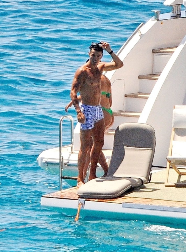 Cristiano Ronaldo relaxes on his luxury yacht on holiday