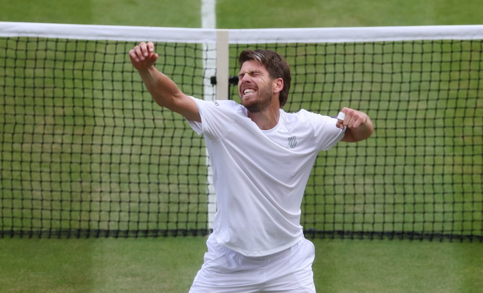 Cameron Norrie celebrates reaching the quarter-finals