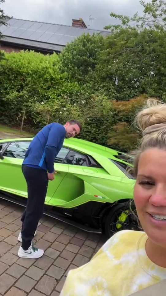 Kerry Katona showed off both the snazzy cars in the video