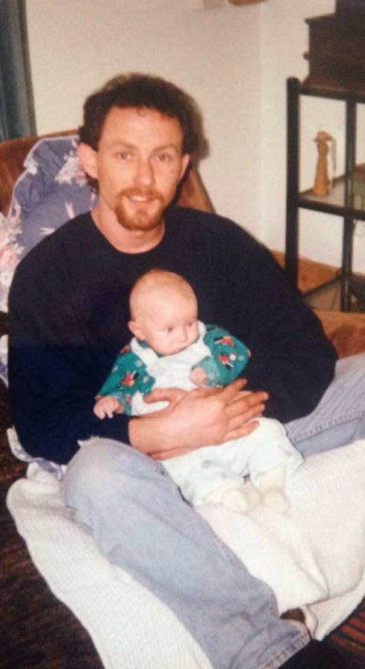 The former neighbour from hell, pictured with son Tommy, was evicted from his home and received an Asbo