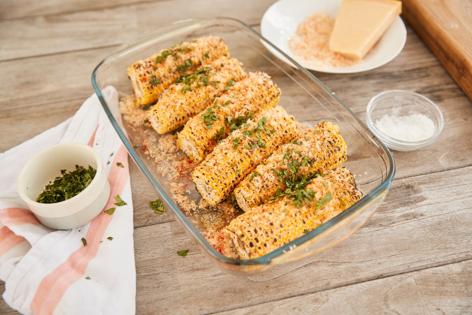 Chargrilled corn on the cob with smoky cheesy topping