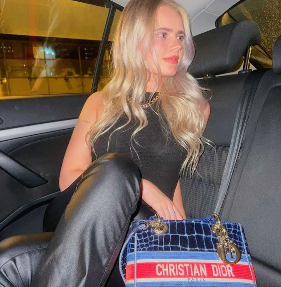 The teen showed off her style in an all black outfit and designer handbag