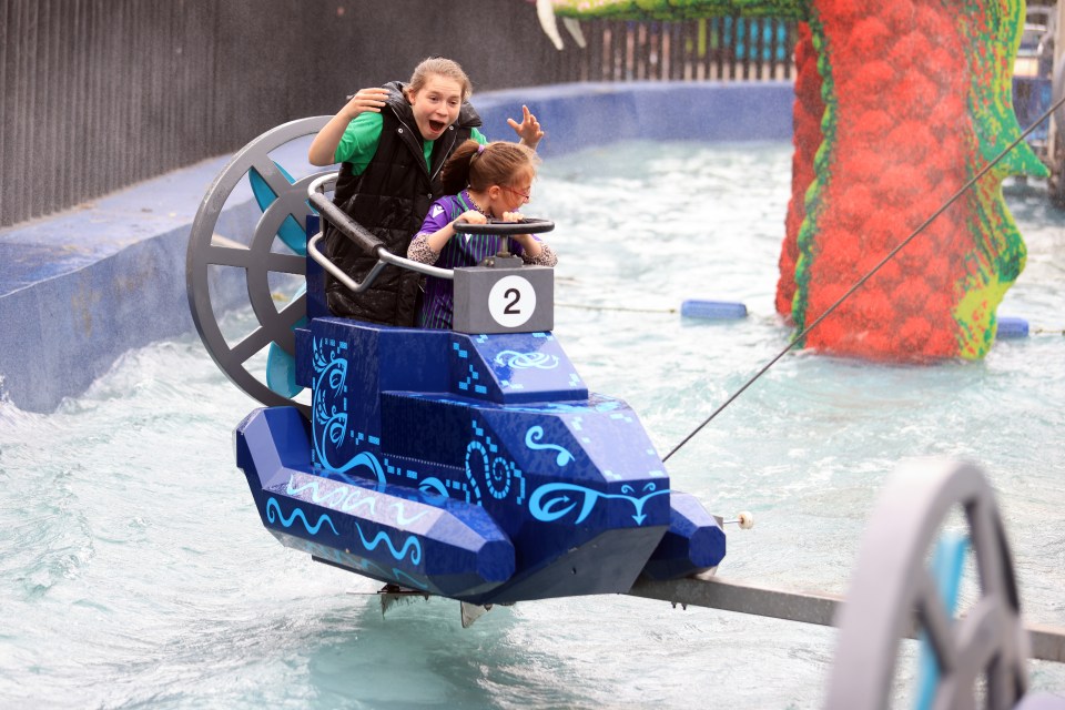 The kids enjoy a ride at the park