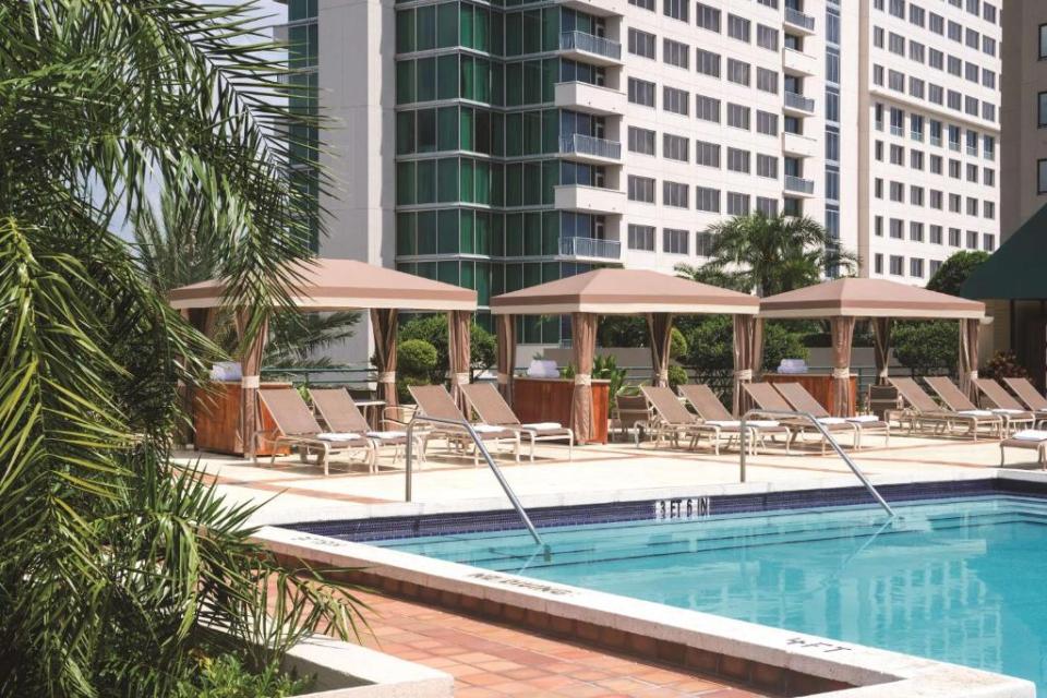 The Hyatt Regency Orlando boasts more than 1600 rooms, including 193 suites, five pools, including one with waterslides, and a spa