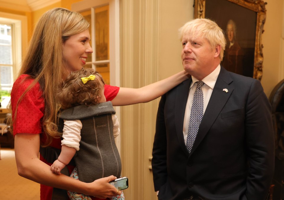 Boris was comforted by wife Carrie soon after making his resignation speech