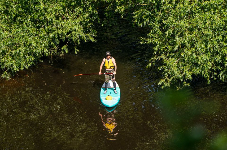 A paddle boarder enjoys the hot weather on the River Nidd in Knaresborough, North Yorkshire