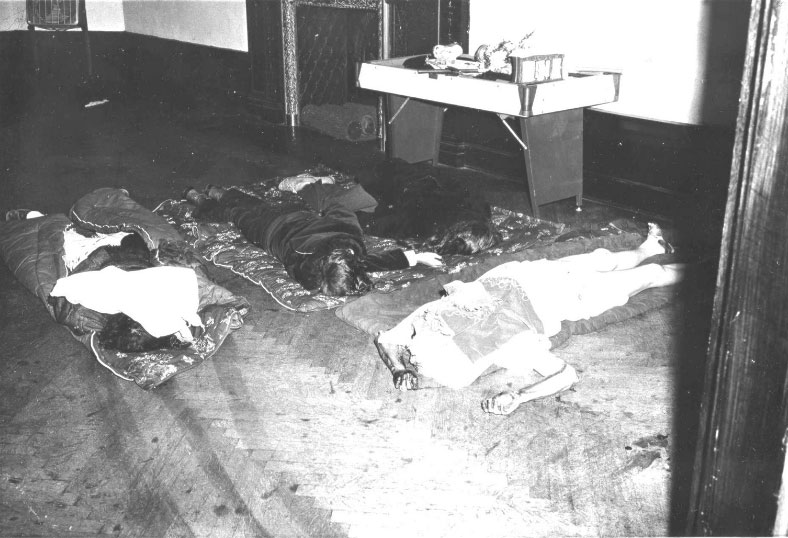 The bodies of his wife and three children were dragged into the ballroom