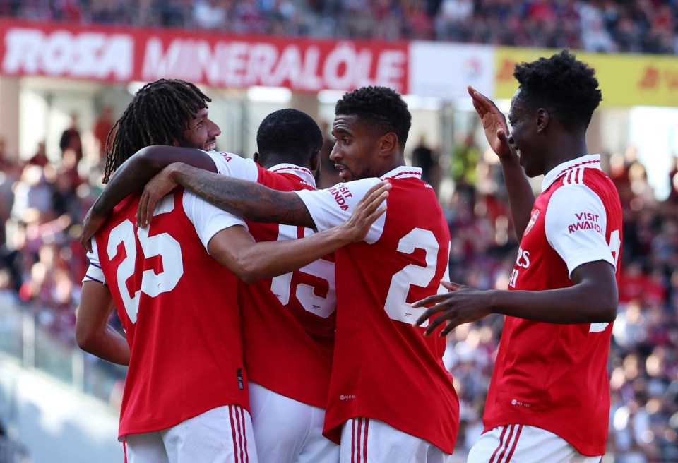 Elneny was mobbed by his team-mates after getting the Gunners back on level terms