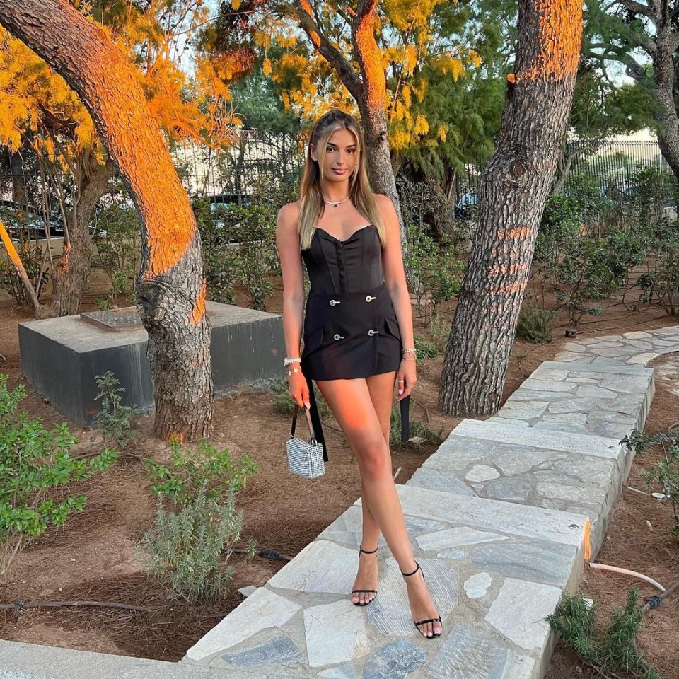 Sasha poses for a photo in the Greek sun