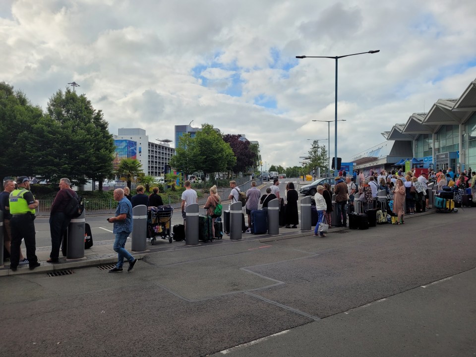 Furious passengers tried to rip open a door to get at their luggage as they endured a 12-hour nightmare with travel giant TUI