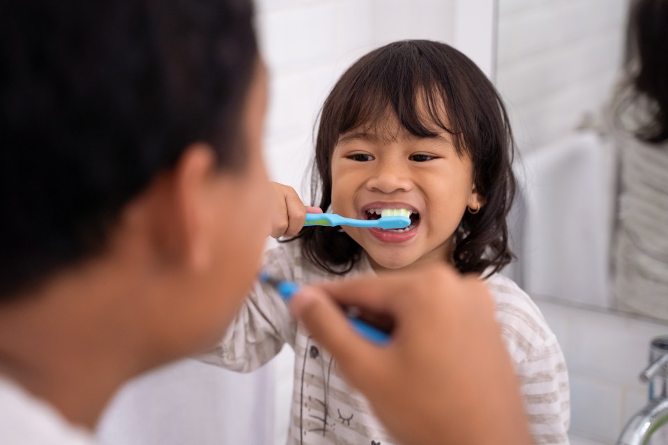 The experts recommend brushing your teeth at the same time which can help kids learn themselves