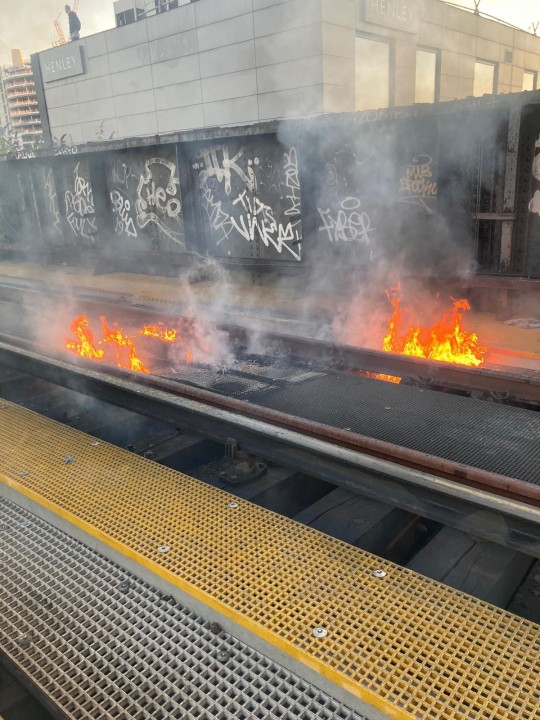 In Battersea, London, train tracks burst into flames