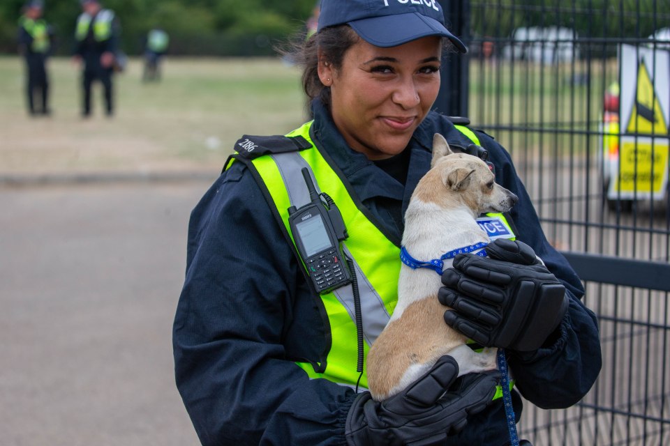 One officer was seen with a dog in her arms