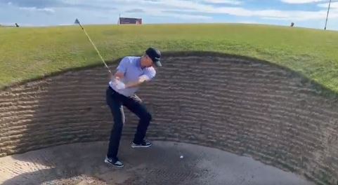 Justin Rose couldn't get his ball out of the bunker with his club