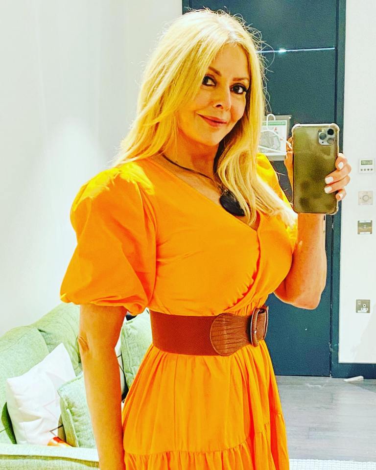 Carol snapped a selfie in her vibrant orange dress before heading on the show