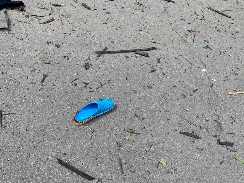 A shoe lies on the ground near the site of the missile attack in Vinnytsia