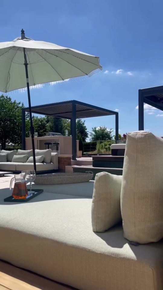 The couple added two new sun loungers to their stunning backyard