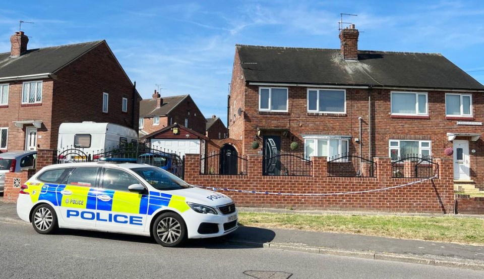 Police forensic officers at the scene yesterday