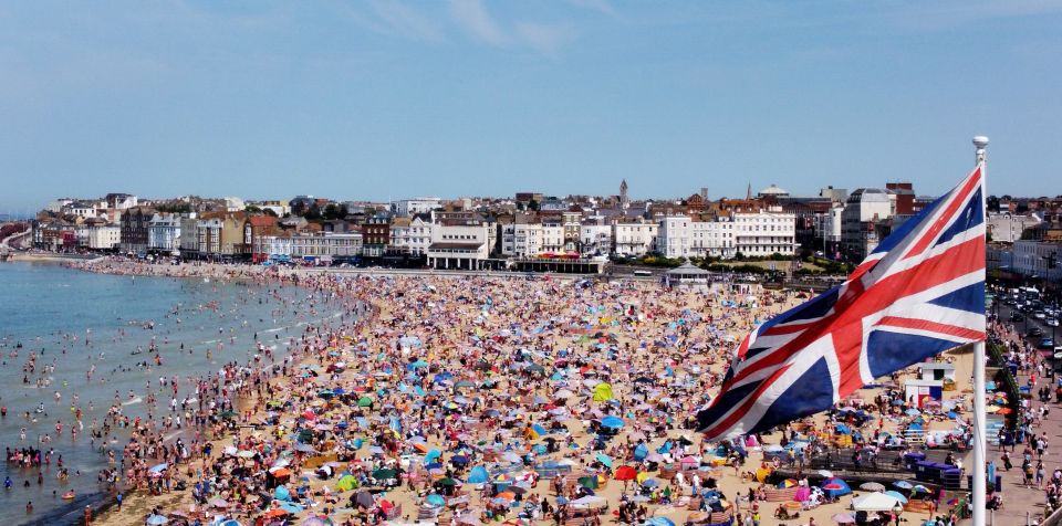 Millions of workers are expected to stay at home over the next 48 hours as the heatwave hits its peak - pictured Margate, Kent