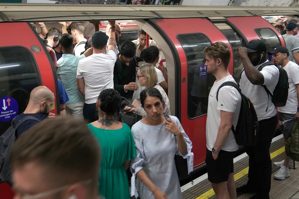 Brits piled onto packed tube carriages in London this morning