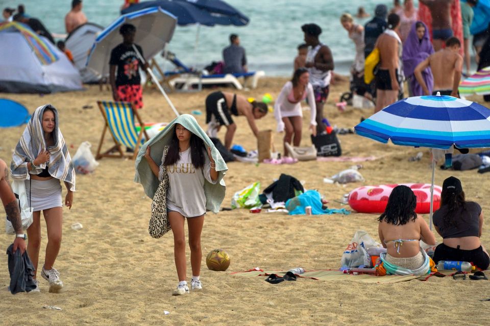 Rain hit parts of the country last night after temperatures soared to the hottest on record